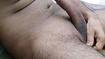 Indian desi gay teases with big cock in public spot