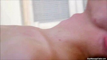 Twink receives hot blowjob during gay massage, leading to bareback action.