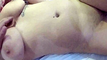 Busty beauty teases through the slit in her skirt