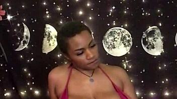 Lolabug in Tiny Pink Bikini Creams on Dildo During Solo Masturbation Session. Watch Her Hairy Ebony Pussy!