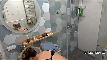 alex caught on voyeur cam in the shower, fully unaware.