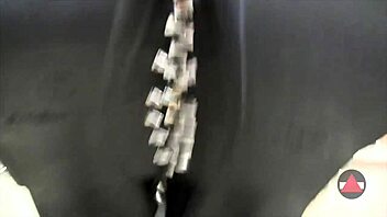 sexy babe dangles shoes in pantyhose close up