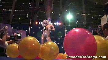 Stepmother goes topless on the public stage