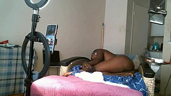 Solo sexy african american milf naked with saggy tits.