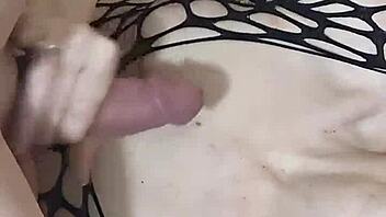 wife in fishnets and lingerie with husband