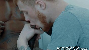 Cute gay ginger interacts with muscular hunk in interracial scene