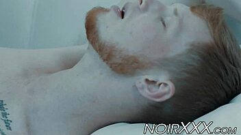 Cute gay ginger interacts with muscular hunk in interracial scene