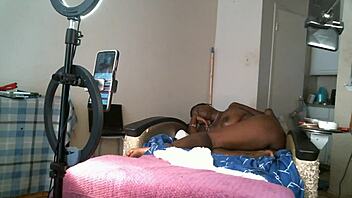 Solo sexy african american milf naked with saggy tits.