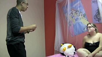 This chubby teen 18+ gives a handjob to a monster cock.