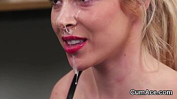 Slut gets covered in cum while eating cream