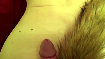 Fox tail couple engages in intimate sex