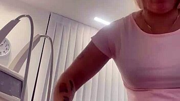 blonde teases by removing clothes then dressing again