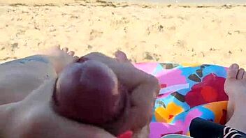 Public beach sex with an amateur couple who like rough sex and facial finish
