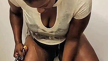 Ebony Babe Intensely Masturbates in Shower While Fully Clothed