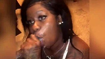 Watch her give wet sloppy head to that big black dick!