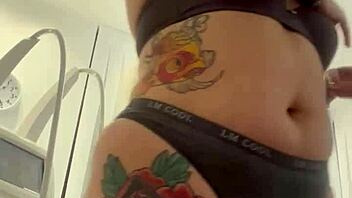 blonde teases by removing clothes then dressing again