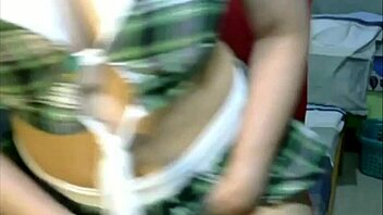 an asian girl engages in chatsex on webcam