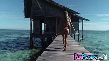 Blonde MILF Olivia Preston undresses on the beach