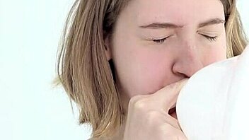 Young Babe Blowing and Popping Her First Balloon