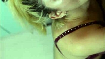 A Blonde Teen Gives A Blowjob In The Homemade Kitchen Setting