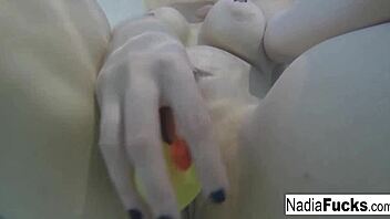 Sexy nadia bathes with rubber duckies