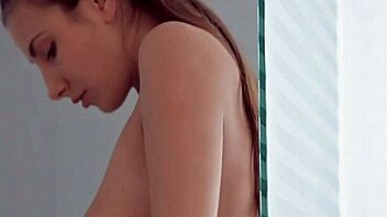 Beautiful college girl enjoys solo pleasure with a sex toy