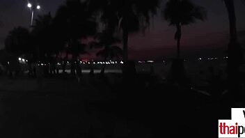 Thai teen Cherry gives an amazing handjob to a huge white cock.