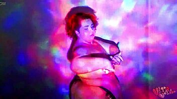 A red-haired BBW performs a worship dance with oil