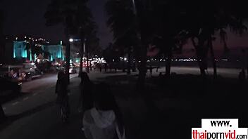 Thai teen Cherry gives an amazing handjob to a huge white cock.