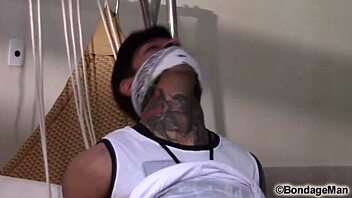 Gay casting with muscular Brazilian guy in bondage