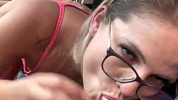 Blonde in sheer costume gives deep throat blowjob in Uber traffic.