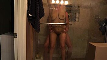 Amateur couple has sex in the shower with a big cock