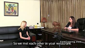 Blonde agent fingers her natural big tits on sofa during interview