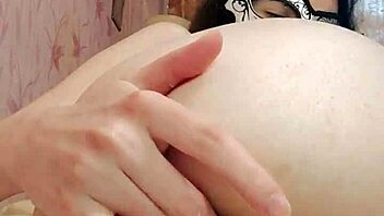 Close up and personal look at a horny brunette's wet pussy