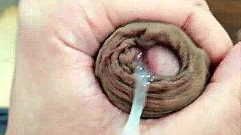 Brazilian twink masturbates and cums in homemade video with neighbors watching.