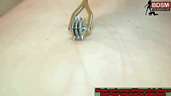 German mistress sadistically punishes slave in BDSM studio