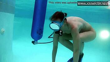 Solo play with a dildo under the water