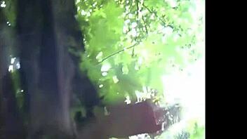 See this exhibitionist flashing big natural tits in the park?