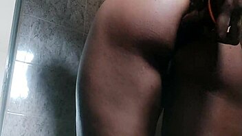 Katy Katie relaxes under hot shower with sexy body