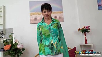 Europemature lady teases with sensual solo striptease