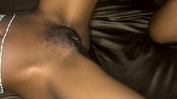 a curvy black woman with small waist in homemade video