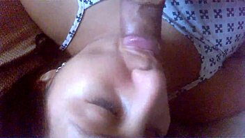 This video features a latina performing oral sex on a partner