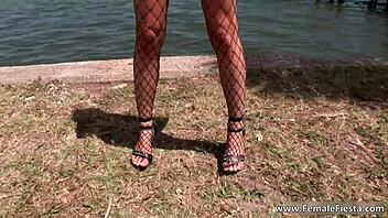 look at this hot redhead in bikini touching herself