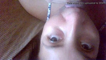 This video features a latina performing oral sex on a partner