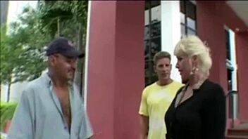 A MILF is treated roughly in a threesome adult group