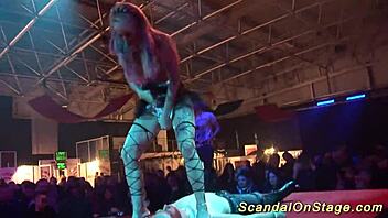 Yo, wanna see this scandal striptease on a public stage?