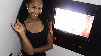 Petite hottie with small tits blows strangers at gloryhole.