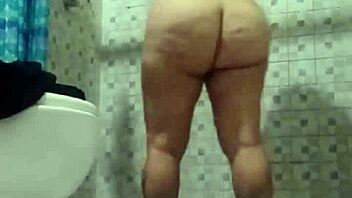 Hidden Camera Catches Mature Stepmom Flashing Big Tits in Bathroom. Latina Milf Exposed!