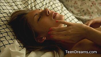 Anjelica is playing with her shaved pussy using a vibrator.