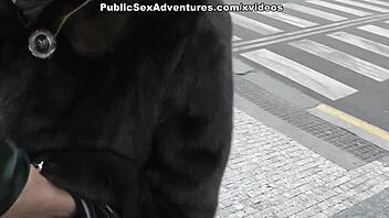 Big breasted woman gives a blow job on the street